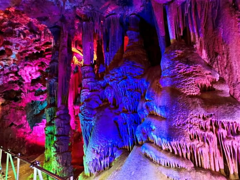 From Sofia: Belogradchik Fortress & Venetsa Cave 12 hrs Tour - Venetsa Cave: modern colored lighting in an ancient underground room