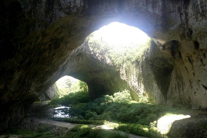 Private Day Trip to Krushuna Waterfalls and Devetashka Cave - Devetashka Cave: Karst, Big Light, and Greenery Underground